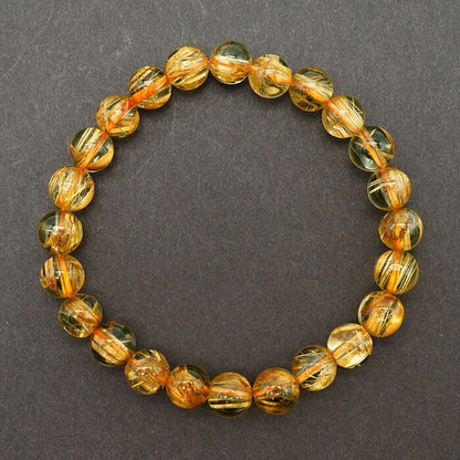 Titin Rutile Quartz 7.6mm bracelet (One-of-a-kind) [01010701007602205010]